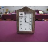 A Modern Hallmarked Silver Mounted Clock, on plush freestanding back, overall height 16.8cm high.
