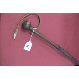 A Hardwood Walking Staff with Twister Shaft, with knop head, leather wrist thong with stag tip,