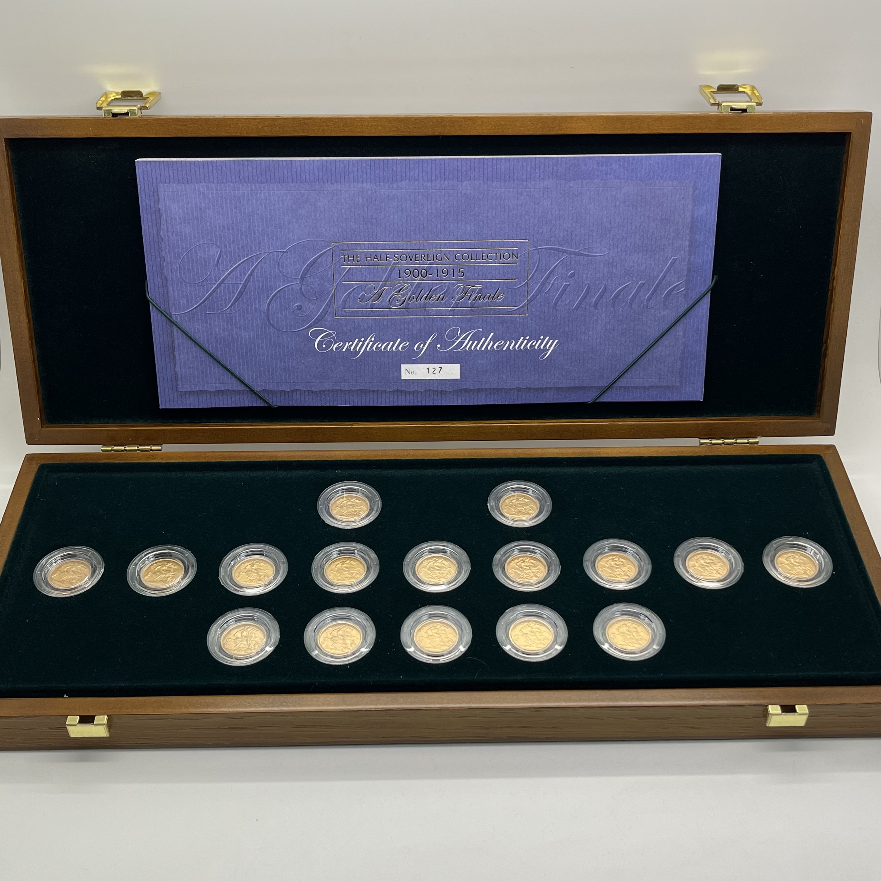 Royal Mint 1900 - 1915 Gold Half Sovereign Golden Finale Coin Set, sixteen coins in total, in wooden