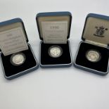 Three Royal Mint Silver Proof £1 Coins, 1986, 1995 and 1996, all cased.