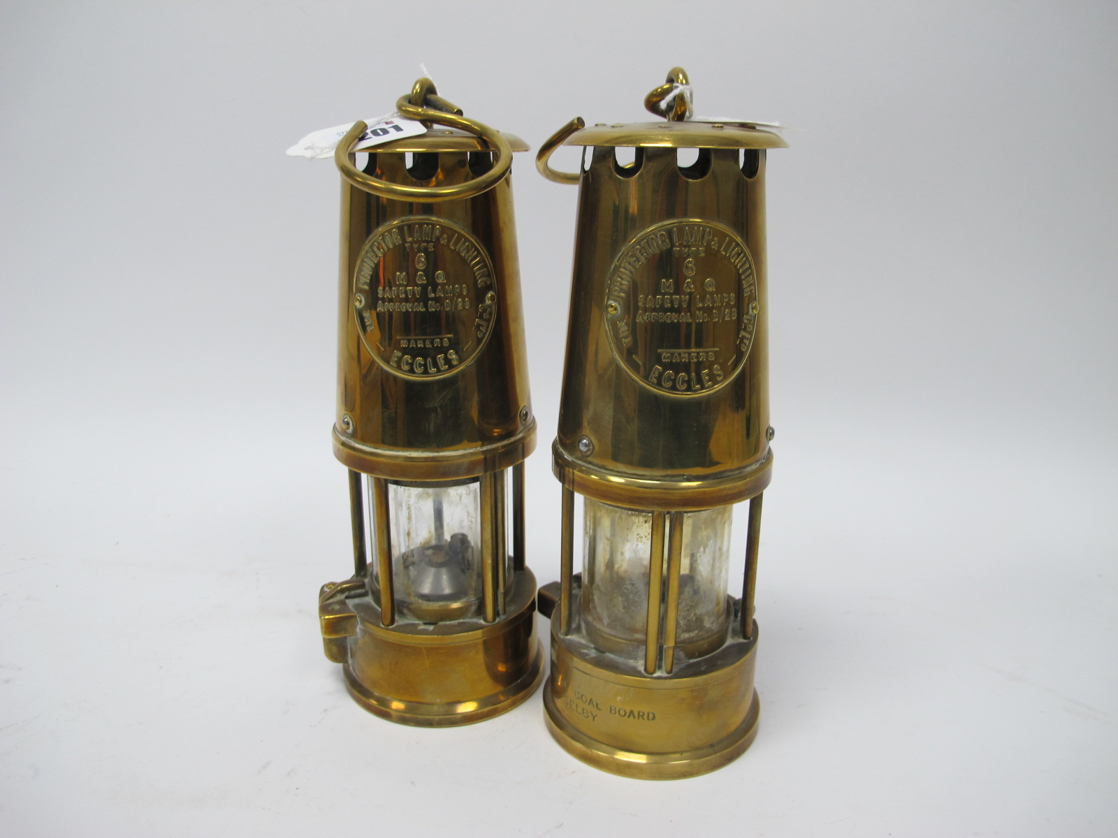 Miners Lamps Projector of Eccles Type 6, M Q both brass bodied, one stamped National Coal Board,