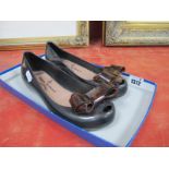 A Pair of Vivienne Westwood 'Melissa' Black Ballet Flats, with bronze bow trim and open toe, size