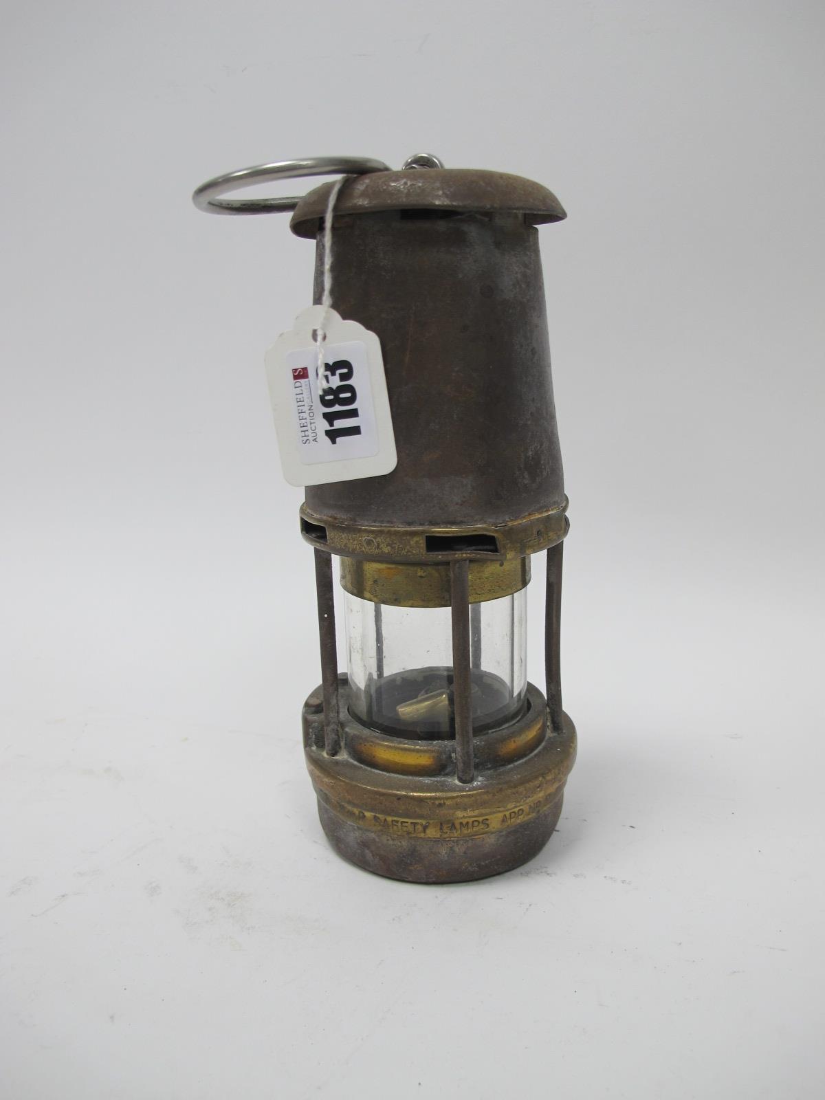 Miners Lamp, Wolf Type FG, App No B2/222 'TH' to plaque on top, 21cm high with handle down.