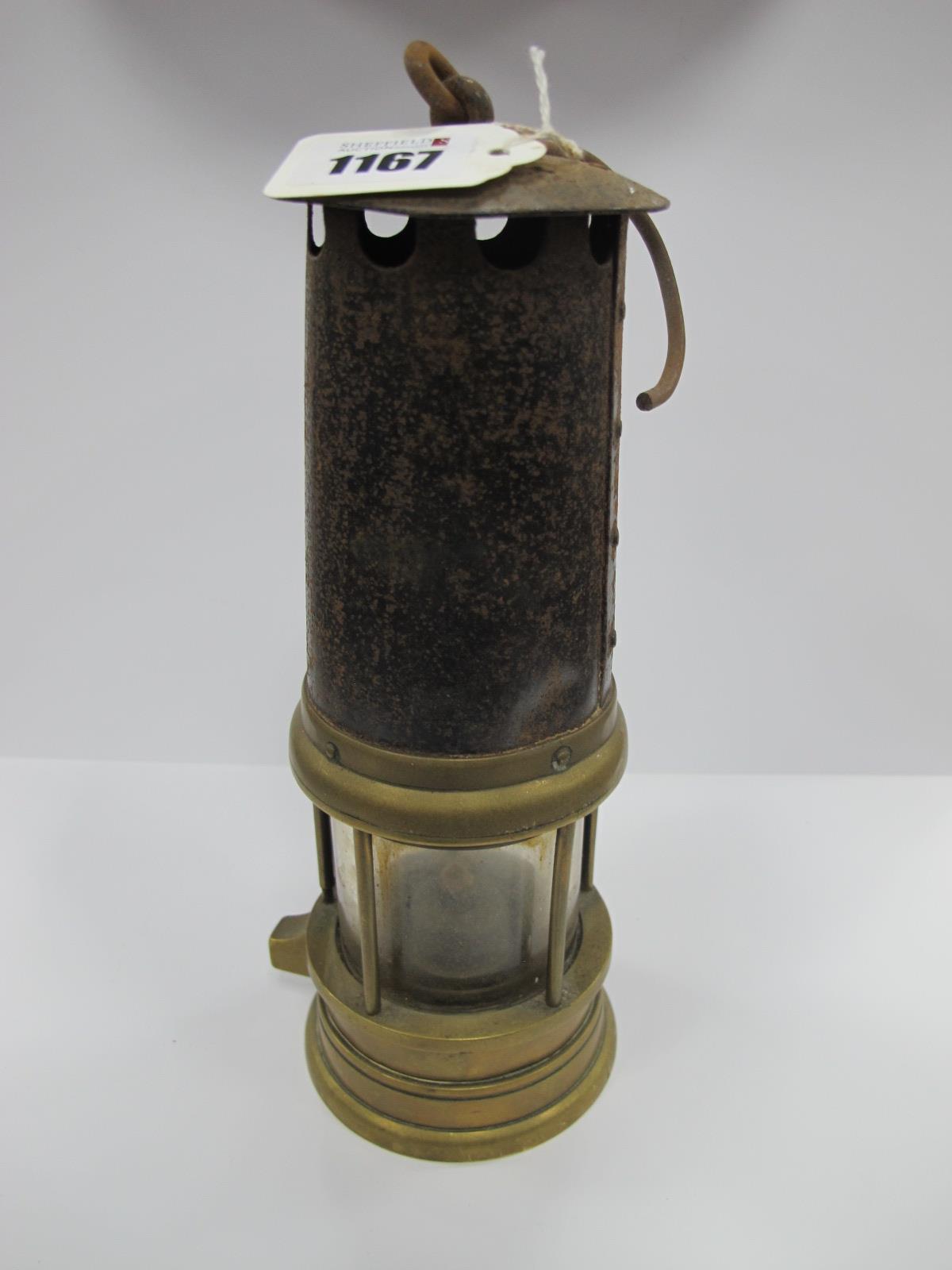 Miners Lamp, T & W, Aberdare, 65 stamped to brass lower body, 24cm high with handle down.