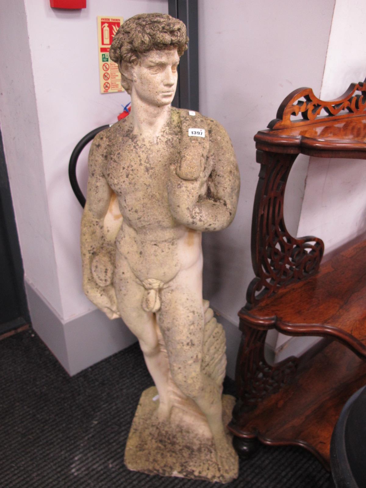 A Concrete Garden Figure, of classical nude male by wall, approximately 114cm high.