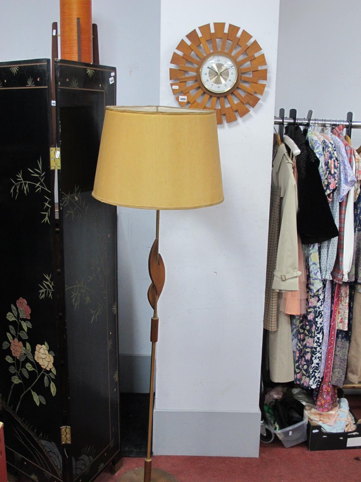 A Bentima Battery Wall Clock, with teak wheel surround, 41cm diameter; together with a brass tubular