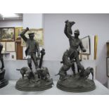 A Pair of Early XX Century Spelter Figures of Huntsmen with Hounds and Fox, raised on rocky mounds