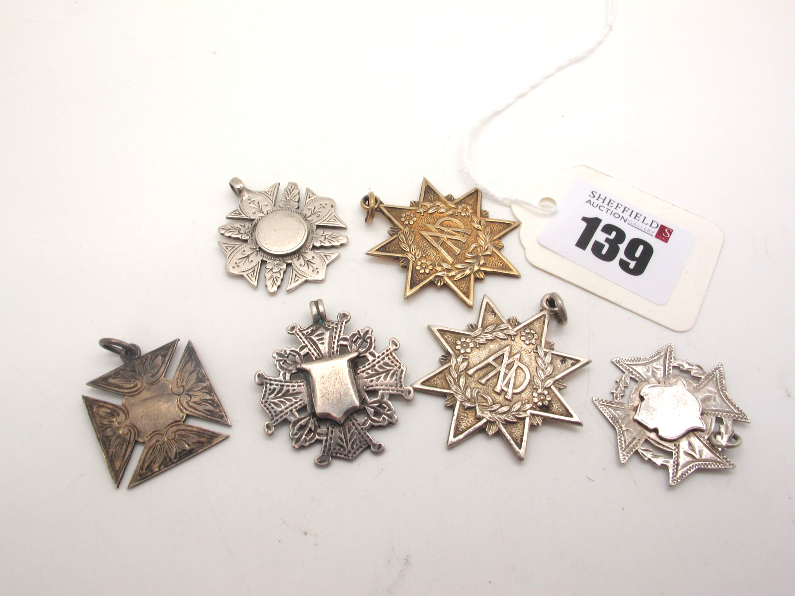 Six Assorted Hallmarked Silver Medallion Pendants, (various dates / makers). (6)