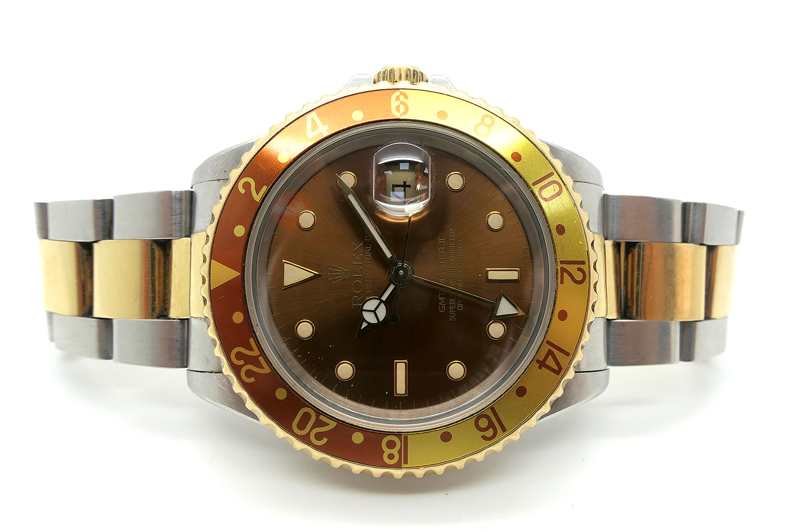 Rolex; A c.1991 GMT Master 'Root Beer' Bi-Metal Automatic Gent's Wristwatch, Model: 16713, Serial