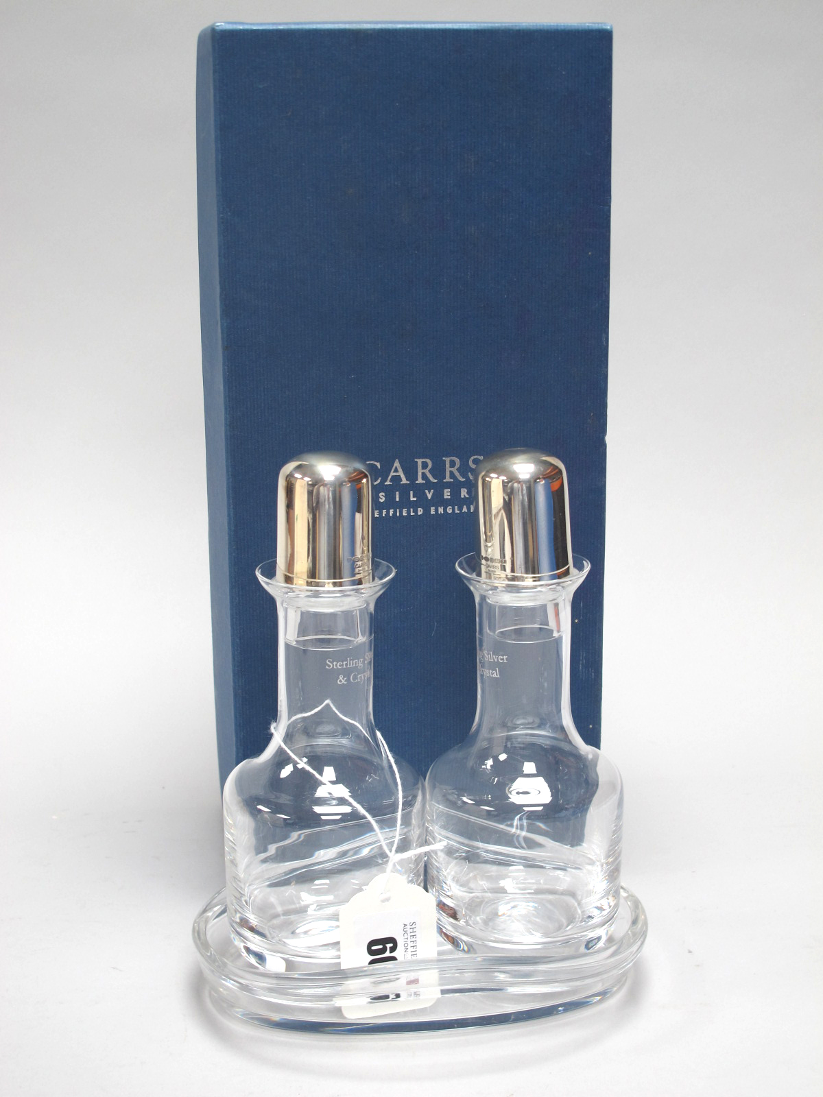 A Pair of Modern Hallmarked Silver Mounted Stoppered Bottles on Stand, RC (Carrs), Sheffield 2005,