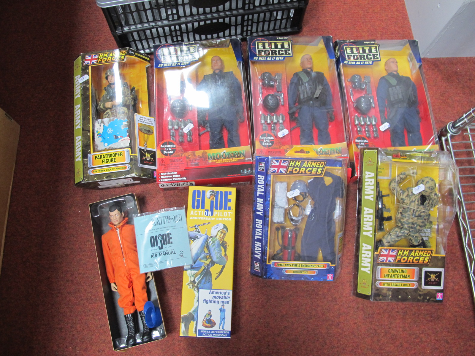 Three Boxed Elite Force Action Figures, with three H.M. Armed Forces and a GI Joe. Boxes poor-good.