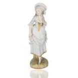 A FRENCH BISQUE PORCELAIN STATUETTE