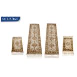 A GROUP OF FOUR GERMAN VERONA RUGS