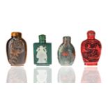 GROUP OF FOUR CHINESE STONE AND LACQUER SNUFF BOTTLES