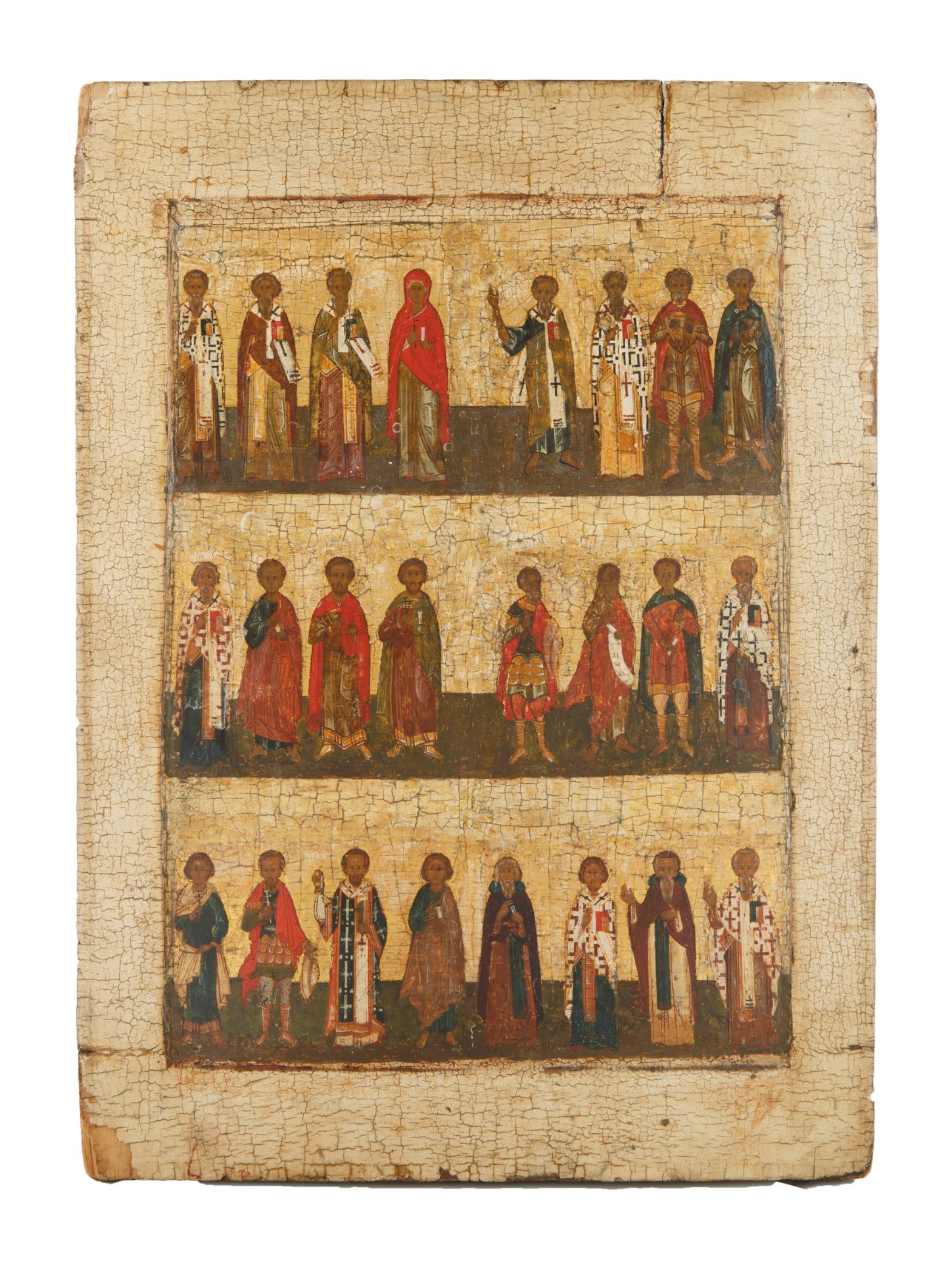 A RUSSIAN ICON OF 24 SAINTS, CIRCA 1560