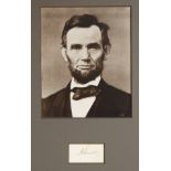 A CUT SIGNATURE AND PHOTOGRAPH [ABRAHAM LINCOLN] FORMER PRESIDENT