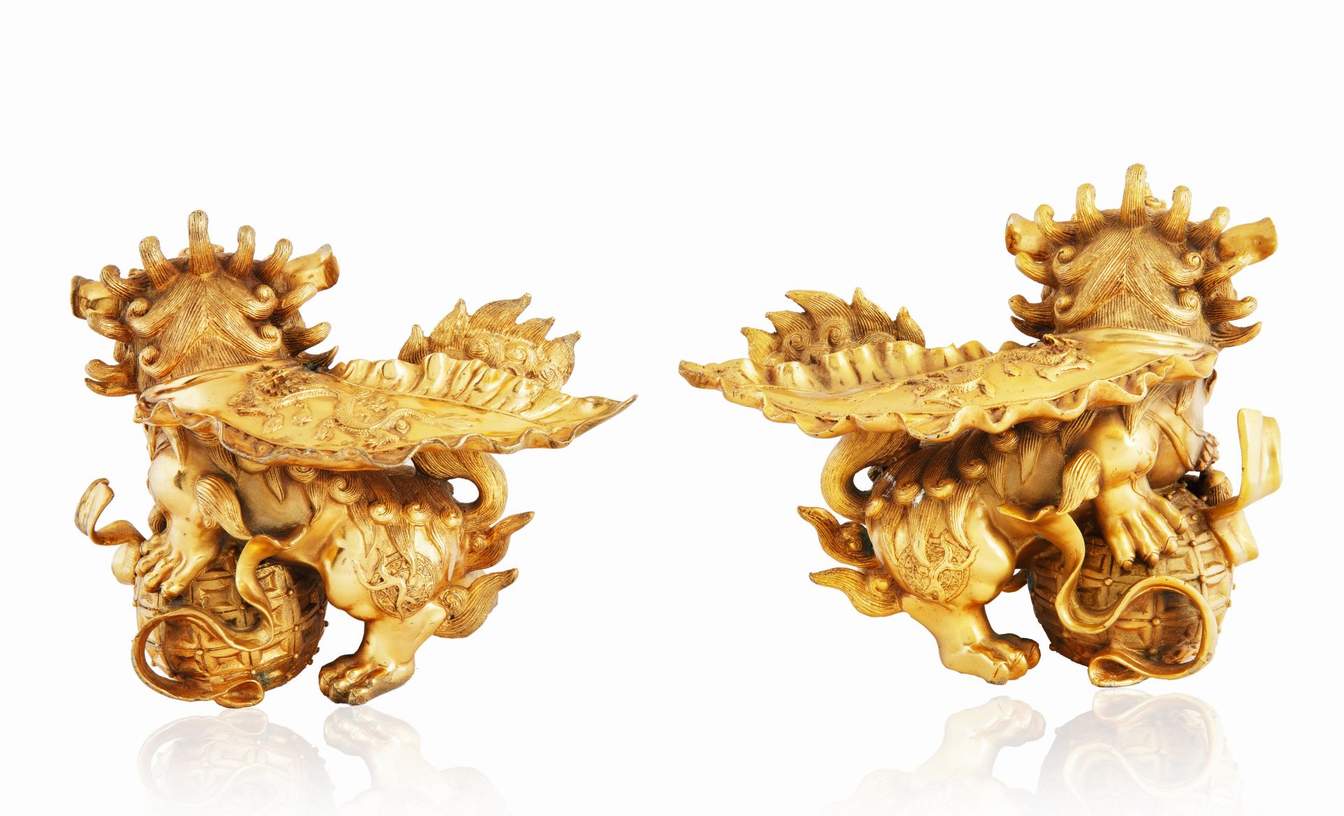 A PAIR OF CHINOISERIE GILT BRASS ORMOLU DOGS OF FOO - Image 2 of 3