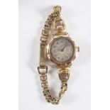 9 CT. YELLOW GOLD LADY'S WATCH