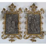 PAIR OF EARLY 20TH-CENTURY PEWTER WALL PLAQUES