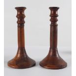 PAIR OF GEORGE III IRISH YEWWOOD CANDLESTICKS