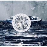 18CT WHITE GOLD HALO RING