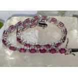 18CT WHITE GOLD RUBY & DIAMOND TENNIS BRACELET