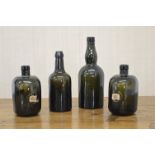 COLLECTION OF FOUR EARLY GLASS WINE BOTTLES