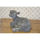 MOULDED STONE FIGURE OF A SEATED LAMB