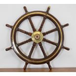 LARGE BRASS MOUNTED SHIP'S WHEEL