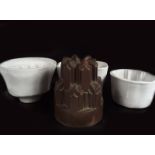 GROUP OF 4 19TH-CENTURY JELLY MOULDS