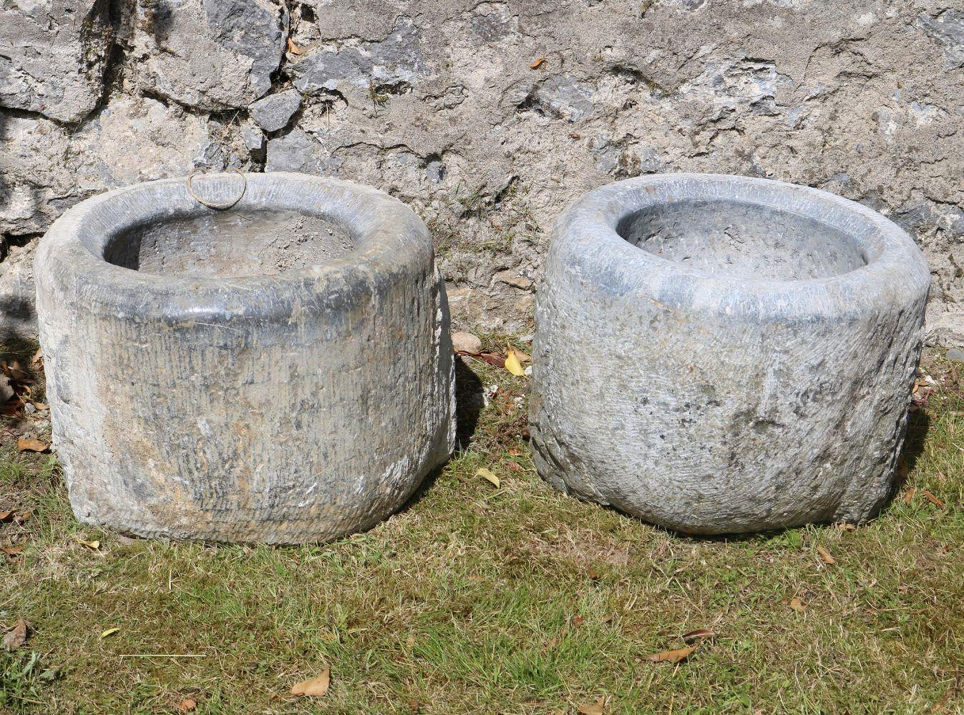 PAIR OF 18TH-CENTURY LIMESTONE URNS