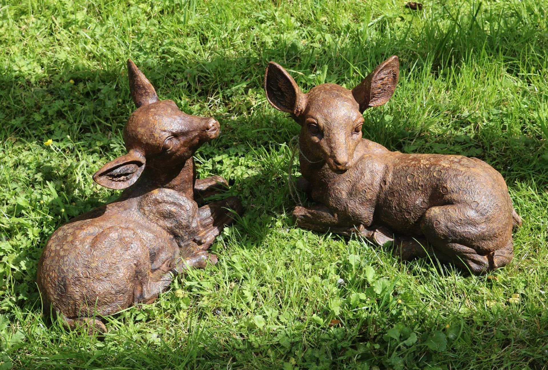 PAIR OF CAST IRON FAWNS