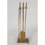 EDWARDIAN BRASS COMPANION SET