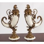 PAIR OF BRASS MOUNTED CORNUCOPIA VASES