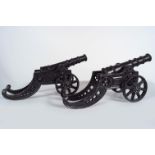 PAIR OF CAST IRON CANNONS