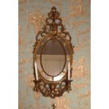 PAIR OF ORNATE GILT FRAMED SCONCE MIRRORS