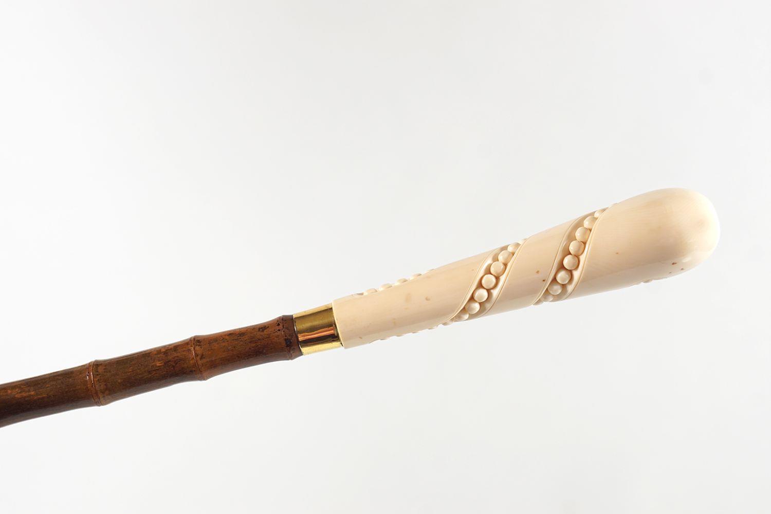 19TH-CENTURY IVORY HANDLED WALKING STICK