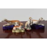 GROUP OF FOUR 19TH-CENTURY STAFFORDSHIRE DOGS