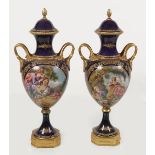 PAIR ORMOLU MOUNTED PORCELAIN & PARCIL GILT URNS