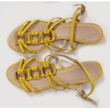 YELLOW FLAT SANDALS BY CHANEL