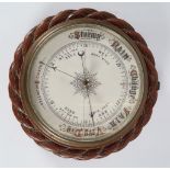 EDWARDIAN OAK CASED ANEROID BAROMETER