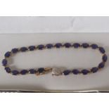 9 CT. GOLD & SAPPHIRE TENNIS BRACELET