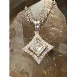 18CT. WHITE GOLD ASHER CUT DIAMOND PENDANT