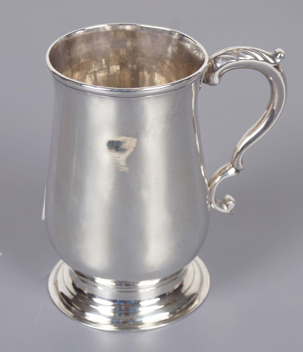 LADY'S SILVER TANKARD