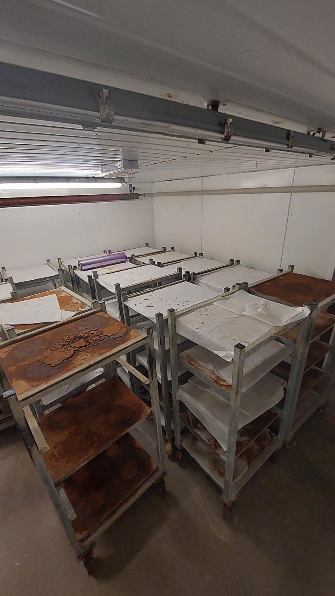 10 Galvanised wheeled cheese trolleys c/w removeable shelves (5 shelves per trolley)