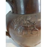 EARLY STONEWARE BROWN SCULPTED PITCHER