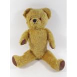 A vintage gold mohair teddy bear