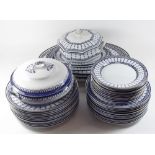 An Edwardian Losol Ware blue and white dinner service comprising: twelve dinner plates, twelve