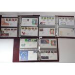 GB: 3 maroon Royal Mail FDC albums with clean, typed QEII defin & commem decimal covers, incl