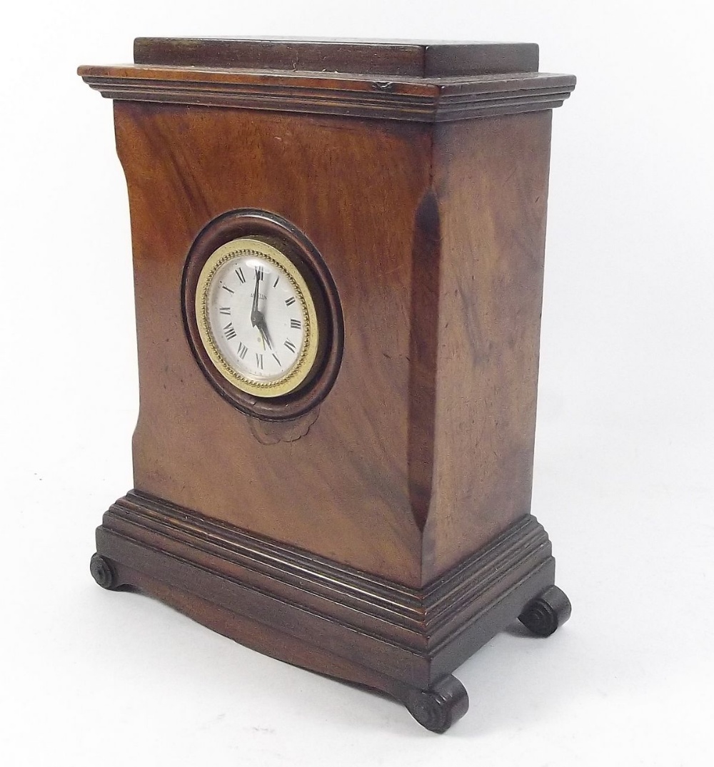 A walnut mantel clock with replacement movement, 19cm high